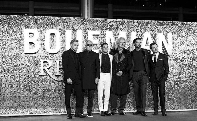 Queen band members Brian May and Roger Taylor. Producers Graham King and Jim Beach (the band’s original manager) joined the cast and band on the red carpet Queen band members Brian May and Roger Taylor. Producers Graham King and Jim Beach (the band’s original manager) joined the cast and band on the red carpet